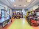 Community game room features air hockey and arcade games at 9355 Sommerset Hills Dr # 9355, Davenport, FL 33896