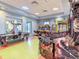 Community game room features air hockey and arcade games at 9355 Sommerset Hills Dr # 9355, Davenport, FL 33896