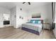 Main bedroom with king-size bed and ensuite bathroom at 9355 Sommerset Hills Dr # 9355, Davenport, FL 33896
