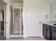Bathroom with walk-in shower and double vanity at 9355 Sommerset Hills Dr # 9355, Davenport, FL 33896