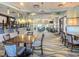 Community dining area with tables and chairs at 9355 Sommerset Hills Dr # 9355, Davenport, FL 33896