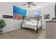 Bedroom with bunk bed, ocean tapestry, and window at 9355 Sommerset Hills Dr # 9355, Davenport, FL 33896