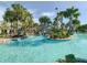 Fun water slide leading into a refreshing pool at 9355 Sommerset Hills Dr # 9355, Davenport, FL 33896