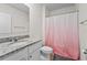 Well-lit bathroom with shower and granite countertop at 2807 Harmonia Hammock Rd, Harmony, FL 34773