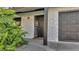 Newly remodeled front entrance with a dark brown door and stone facade at 3722 Paige St, Port Orange, FL 32129