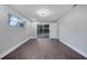 Spacious bedroom with sliding glass doors to backyard at 3722 Paige St, Port Orange, FL 32129