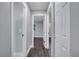 Clean hallway with doors to bedrooms and bath at 3722 Paige St, Port Orange, FL 32129