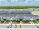 Aerial view of townhomes with private pools and lush landscaping at 4222 Paragraph Dr, Kissimmee, FL 34746