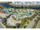 Community pool with water features and landscaping at 4222 Paragraph Dr, Kissimmee, FL 34746