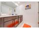 Stylish bathroom with double vanity and modern finishes at 4222 Paragraph Dr, Kissimmee, FL 34746