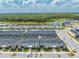 Aerial view of townhomes with private screened pools and lush landscaping at 4222 Paragraph Dr, Kissimmee, FL 34746
