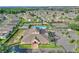 Large community center with pool, tennis courts, and parking lot at 405 High Vista Dr, Davenport, FL 33837