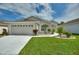House exterior with landscaping and driveway at 405 High Vista Dr, Davenport, FL 33837
