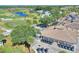 Community clubhouse with golf carts and a parking lot at 405 High Vista Dr, Davenport, FL 33837