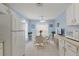 Cozy dining area with table and chairs near kitchen at 405 High Vista Dr, Davenport, FL 33837