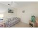 Spacious bedroom with couch and decorative accents at 405 High Vista Dr, Davenport, FL 33837