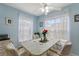 Bright dining area with table and chairs near window at 405 High Vista Dr, Davenport, FL 33837