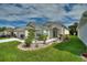 Attractive curb appeal with landscaping and walkway at 405 High Vista Dr, Davenport, FL 33837