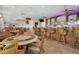 Relaxing clubhouse bar with wicker chairs and a large bar at 405 High Vista Dr, Davenport, FL 33837