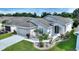 Single-Gathering home with gray roof and landscaped yard at 405 High Vista Dr, Davenport, FL 33837