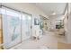 Bright sunroom with sliding doors and seating area at 405 High Vista Dr, Davenport, FL 33837