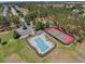 Aerial view of community pool and tennis court at 1556 N Hampton Dr, Davenport, FL 33897