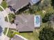 Top-down aerial view of house with pool at 1556 N Hampton Dr, Davenport, FL 33897