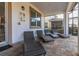 Covered patio with lounge chairs near the pool at 9032 Flamingo Key Way, Kissimmee, FL 34747