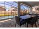 Outdoor patio with dining table and pool view at 9032 Flamingo Key Way, Kissimmee, FL 34747