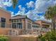 Outdoor patio seating area adjacent to community clubhouse at 9032 Flamingo Key Way, Kissimmee, FL 34747