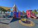 Colorful playground features a castle theme and a spinning toy at 9032 Flamingo Key Way, Kissimmee, FL 34747