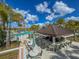 Relaxing pool bar with tables and umbrellas at 9032 Flamingo Key Way, Kissimmee, FL 34747