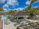 Outdoor pool bar with seating and a covered area at 9032 Flamingo Key Way, Kissimmee, FL 34747
