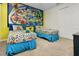 bedroom with Toy Story mural and twin beds at 9032 Flamingo Key Way, Kissimmee, FL 34747