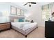 Bright bedroom with king-size bed and ample closet space at 9032 Flamingo Key Way, Kissimmee, FL 34747