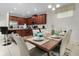 Kitchen with wood cabinets and a breakfast bar at 9032 Flamingo Key Way, Kissimmee, FL 34747
