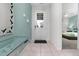 Bright entryway with tile floors, a mirror, and view to a bedroom at 9032 Flamingo Key Way, Kissimmee, FL 34747