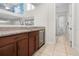 Convenient wet bar with granite countertop and wine cooler at 9032 Flamingo Key Way, Kissimmee, FL 34747