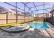 Relaxing screened-in pool and spa area at 9032 Flamingo Key Way, Kissimmee, FL 34747