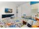 Toy Story themed bedroom with twin beds, dresser, and TV at 9032 Flamingo Key Way, Kissimmee, FL 34747