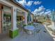 Outdoor bar area with green accents and seating at 9032 Flamingo Key Way, Kissimmee, FL 34747