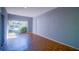 Bright bonus room with sliding glass doors to the backyard at 1501 Ne 57Th St, Ocala, FL 34479