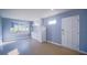 Small kitchenette with white cabinets and bay window at 1501 Ne 57Th St, Ocala, FL 34479