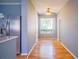 Bright dining room with hardwood floors and large window at 1501 Ne 57Th St, Ocala, FL 34479