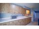View of kitchen with wood cabinets and appliances at 1501 Ne 57Th St, Ocala, FL 34479
