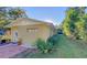 Tan block building with a small patio and yard at 1501 Ne 57Th St, Ocala, FL 34479