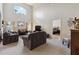 Spacious living room with high ceilings and views into the main bedroom at 241 Grosvenor Loop, Davenport, FL 33897