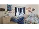 bedroom with twin beds and Cars decor at 241 Grosvenor Loop, Davenport, FL 33897