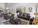 Open living room with views into the kitchen and staircase at 241 Grosvenor Loop, Davenport, FL 33897