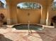 Community hot tub nestled under a shaded pergola at 501 Mirasol Cir # 513, Celebration, FL 34747